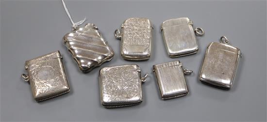 Seven assorted late 19th/early 20th century silver vesta cases, largest 47mm.